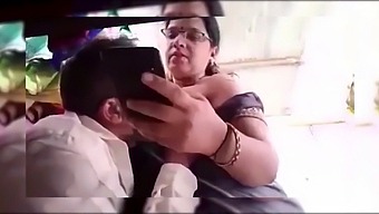 Mature Kannada Housewife Indulges In A Steamy Encounter With A Tailor Who Enjoys Fondling And Sucking Her Breasts