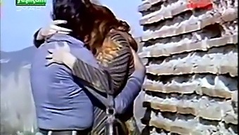 Turkish Couple'S Passionate Kiss And Playful Breasts